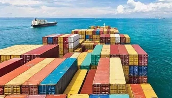 This undated photo shows a cargo ship carrying containers as it sails through international waters. — Reuters
