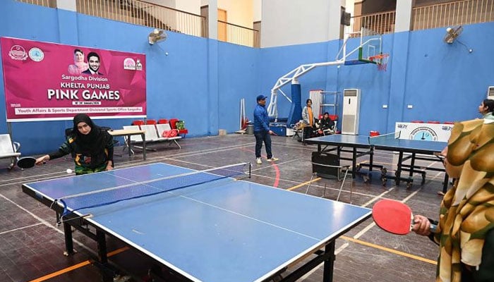 Students participate in table tennis trials during the “Khelta Punjab Pink Games Trials” held at the sports gymnasium. — APP/File
