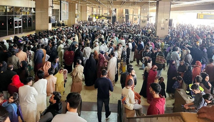 People standing in immigration queues at Karachi Jinnah International Airport on February 9, 2026. — NNI