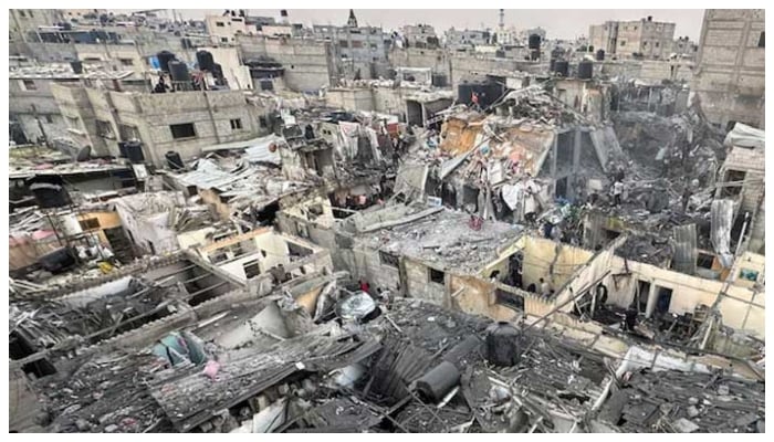 People search through the rubble of damaged buildings following an Israeli air strike on Palestinian houses, amid the ongoing conflict between Israel and Hamas, in Rafah in the southern Gaza Strip December 12, 2023. — Reuters
