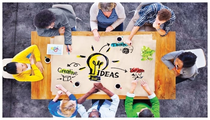 A group of people discussing ideas. —TheNews/File