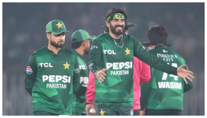 Pakistans Usman Tariq (right) celebrates taking a wicket during their T20I tri-series match against Zimbabwe at the Rawalpindi Cricket Stadium in Rawalpindi on November 23, 2025. — PCB