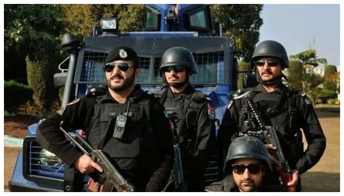 Police personnel stand guard in this undated photo. — KP Police/File