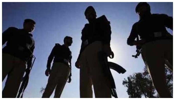 Police officials stand guard in this undated photo. — AFP/File