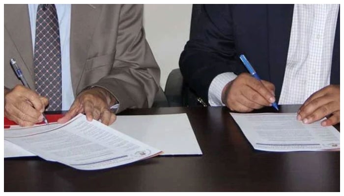 This representational image shows officials signs a MOU during signing ceremony. — APPNA Website/File