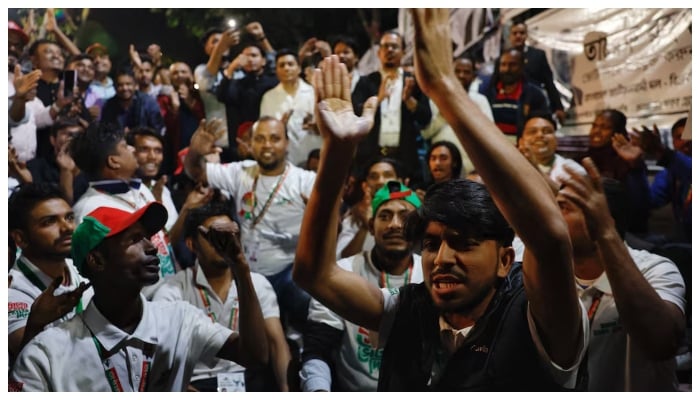 Supporters of the Bangladesh Nationalist Party (BNP) chant slogans as they celebrate unofficial news of Tarique Rahmans win in his constituency in the 13th general election near the partys Gulshan office in Dhaka, Bangladesh, February 12, 2026.—Reuters