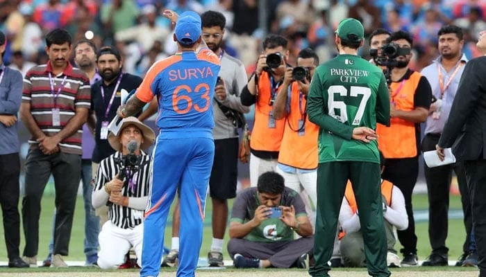Indias Suryakumar Yadav and Pakistans Salman Agha during the coin toss at Asia Cup match on September 14, 2025. — Reuters