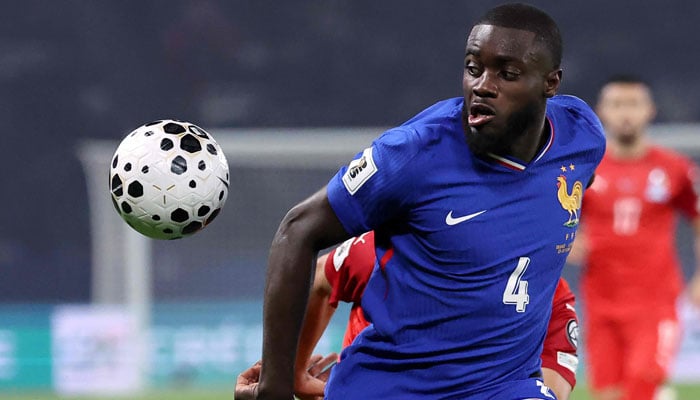 Frances defender #04 Dayot Upamecano watches the ball during the FIFA World Cup 2026 Group D European qualification football match between France and Azerbaijan at the Parc des Princes Stadium in Paris, on October 10, 2025. — AFP