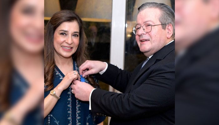French Ambassador Nicolas Galey (right) confers the Ordre National du Mérite (Knight) to Ayesha Raza Farooq, chairperson of the National Commission on the Rights of the Child and National Coordinator for Polio Eradication on February 13, 2026. — Facebook@polioeradicationinitiative