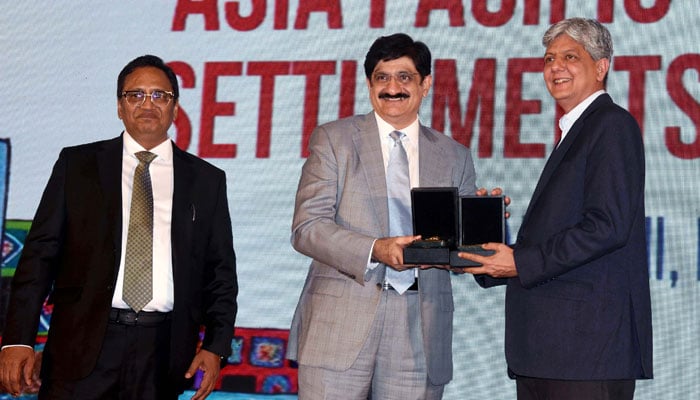 Sindh Chief Minister, Syed Murad Ali Shah, presents awards during the closing ceremony of the three-day Asia-Pacific Shelter and Settlements Forum 2026, in Karachi on February 13, 2026. — PPI