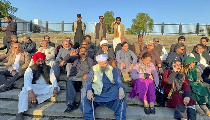 Leader of Opposition in National Assembly Mahmood Khan Achakzai, Chairman PTI Gohar Ali Khan, and others shouting slogans during sit-in protest (Dharna) outside Parliament house Mughal Garden stairs, in the Federal Capital on February 13, 2026. — Online