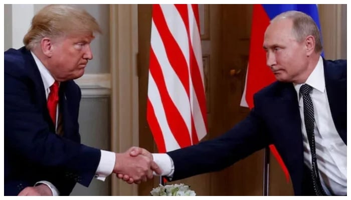 US President Donald Trump and Russias President Vladimir Putin shake hands as they meet in Helsinki, Finland July 16, 2018. — Reuters