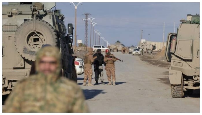 Syrian government forces take possession of an SDF military base as they enter the city of Raqa on January 19, 2026. —AFP