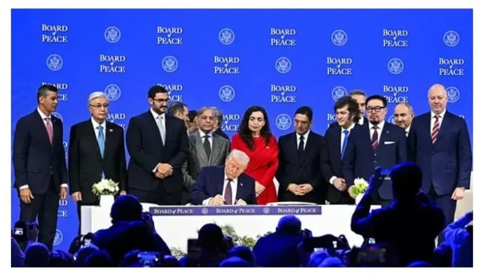 Prime Minister Shehbaz Sharif and others pose with US President Donald Trump signing the founding charter at the “Board of Peace” meeting during the World Economic Forum annual meeting in Davos, Switzerland on January 22,2026. — AFP