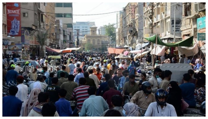 People throng at the Bohri Bazaar in Saddar, Karachi. — AFP/File