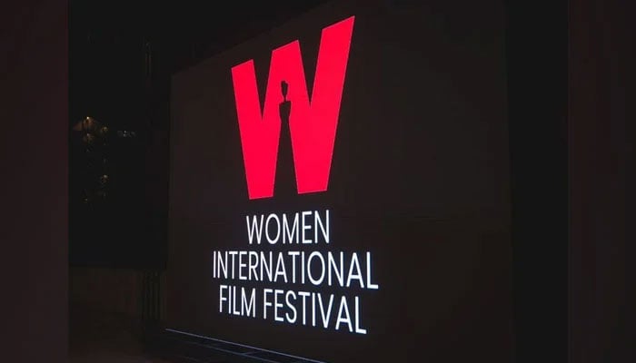 The Women International Film Festival (WIFF) logo can be seen on screen during film festival. — APP/File