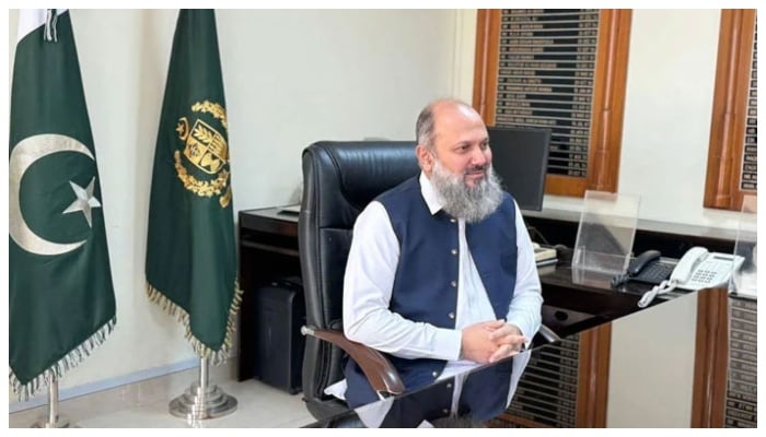 Federal Minister of Commerce Jam Kamal Khan gestures at his office on March 12, 2024. — Facebook/Jam Kamal Khan