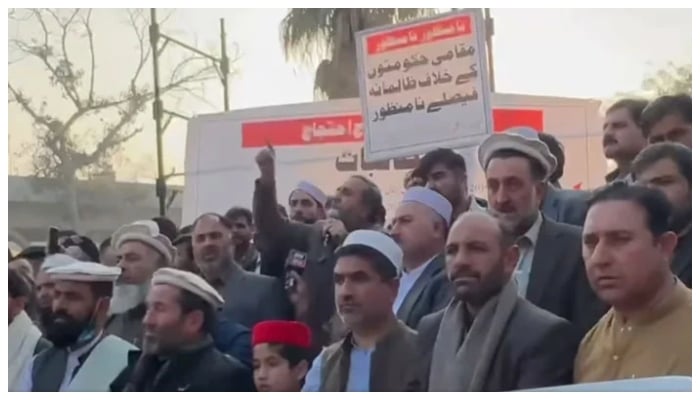 Local Government representatives from across Khyber Pakhtunkhwa are seen protesting while carrying placards and banners inscribed with their demands on Dec 26, 2024. — Screengrab via Facebook@HimayatMayaar