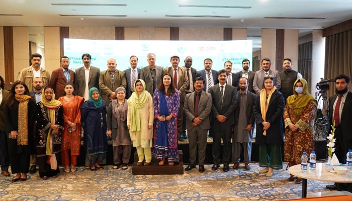 Participants pose for a group photo in this image on February 17, 2026. — APP