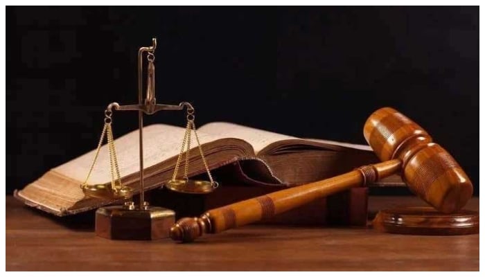 This representational image shows a gavel and scales of justice. — Reuters/File