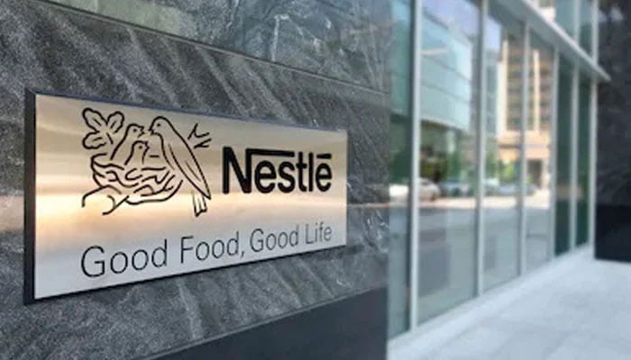 A view of the corporate sign of Nestlé, the worlds largest food and beverage company with the company logo and its tagline. . — Nestle/File