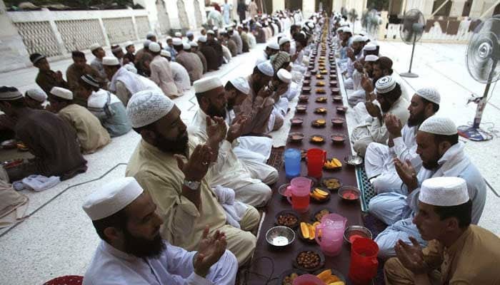 People praying at Iftar time during the holy month of Ramadan. — Reuters/File