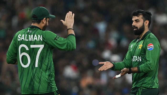 Pakistans Shadab Khan celebrates with captain Salman Agha after taking the wicket of USAs Shayan Jahangir during the 2026 ICC Mens T20 Cricket World Cup group stage match between Pakistan and USA at the Sinhalese Sports Club (SSC) Ground in Colombo on February 10, 2026. — AFP