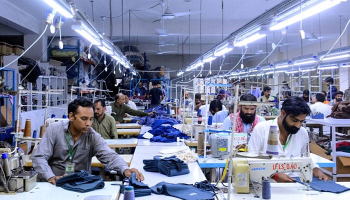 The representational image shows tailors working at a garment factory in Pakistan. — AFP/File