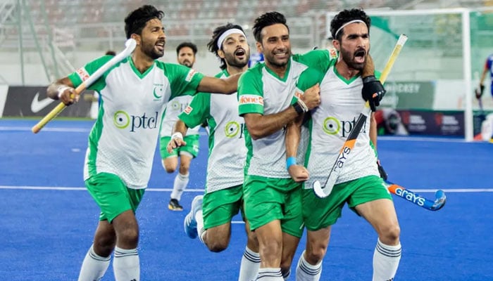 The representational image shows Pakistans hockey players celebrating during a match in this undated image. — FIH website/File