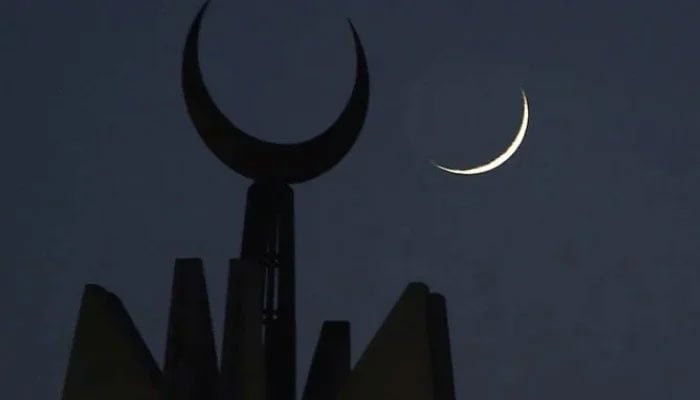 New crescent is seen in the sky in the background of a mosques minaret in this undated image. — AFP/File