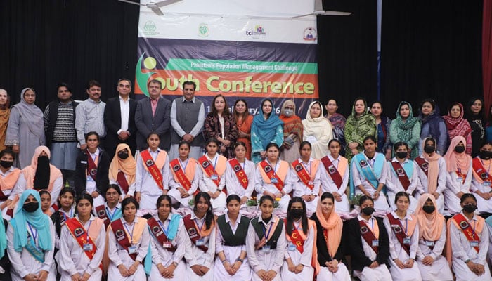 Participants pose for a photo with students at the youth conference at Govt Graduate College for Women, Wahdat Colony, on February 19, 2026. — Facebook@dgpopulationwelfarepunjab