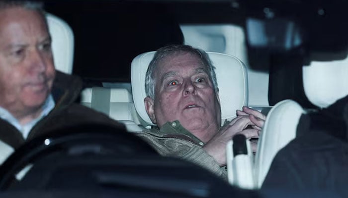 Andrew Mountbatten Windsor, younger brother of Britain’s King Charles, formerly known as Prince Andrew, leaves Aylsham Police Station on a vehicle on February 19, 2026. — Reuters