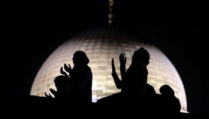 This representational image shows women offering prayer. — Reuters/File