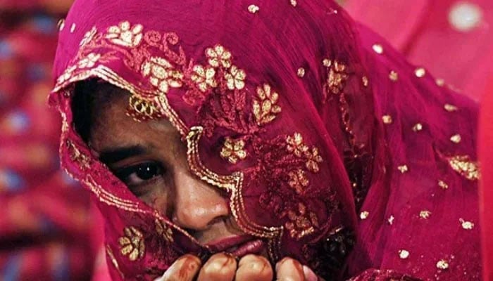 A representational image of a bride in a wedding ceremony in Karachi. — AFP/File
