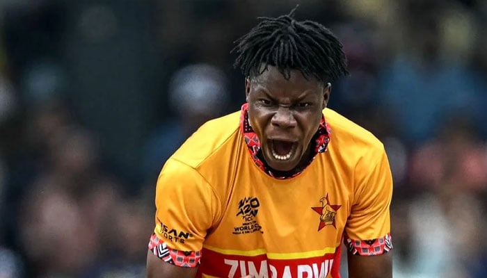Zimbabwes Blessing Muzarabani celebrates after taking the wicket of Sri Lankas Kusal Perera during the T20 World Cup group stage match at the R. Premadasa Stadium in Colombo on Febuary 19, 2026. — AFP