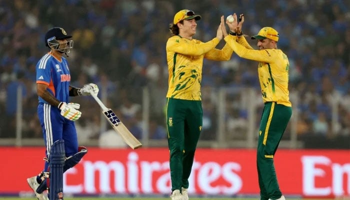 South Africas Dewald Brevis (second from right) celebrates with Keshav Maharaj after taking the catch to dismiss Indias Suryakumar Yadav during their Super Eight match of the ICC Mens T20 World Cup 2026 against India at the Narendra Modi Stadium, February 22, 2026. — Reuters