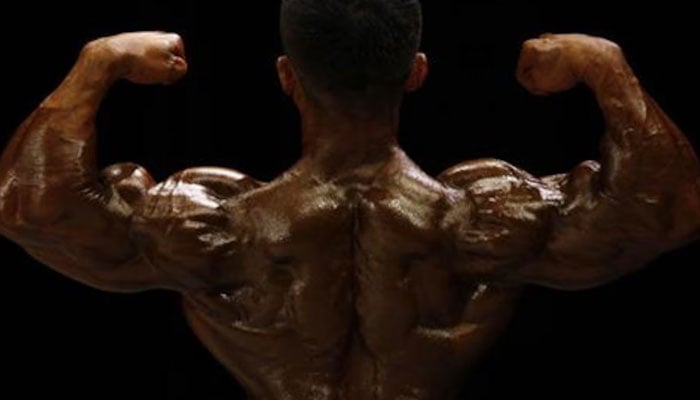 This representational image shows a bodybuilder posing for a photo during a bodybuilding championship. — Reuters/File