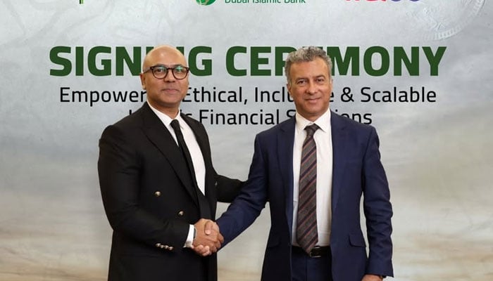 The image shows a signing ceremony between DIB Pakistan and Walee Financial Services (WFS) on February 26, 2026. — Facebook@DIBPakistan