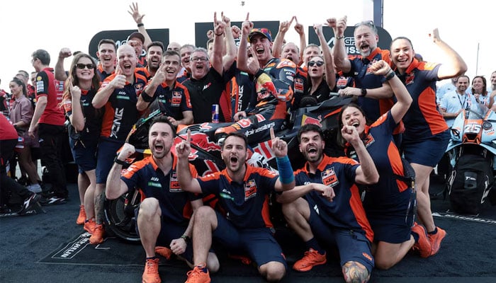 Red Bull KTM Factory Racings Pedro Acosta celebrates with team after winning the MotoGP sprint race. —Reuters