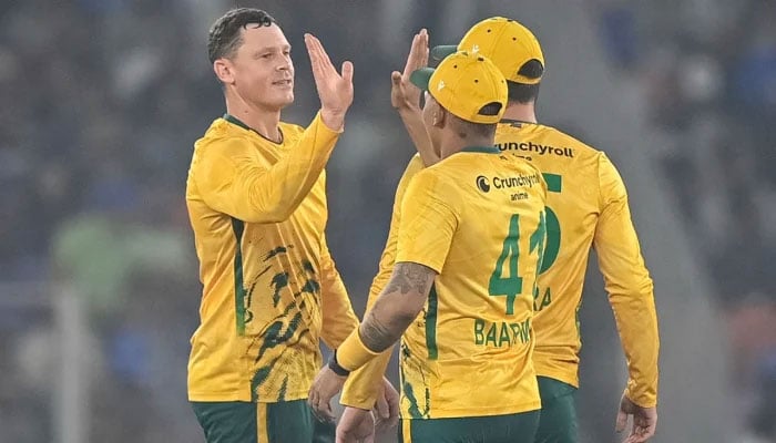 South Africas George Linde (left) celebrates after taking wicket during the fifth T20I against India in Ahmedabad on December 19, 2025. — AFP