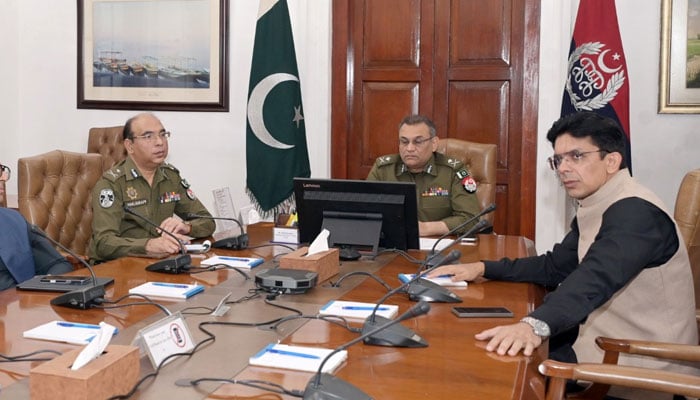 Punjab Enforcement and Regulatory Authority (PERA) DG Capt (retd) Farrukh Atiq (right) in a meeting with  Inspector General Punjab Abdul Kareem (centre) at the Central Police Office on February 28, 2026. — Facebook@punjabpolicecpo