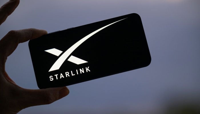 The Starlink logo is displayed on a mobile phone in this photo illustration, Brussels, Belgium, March 23, 2025. — Reuters