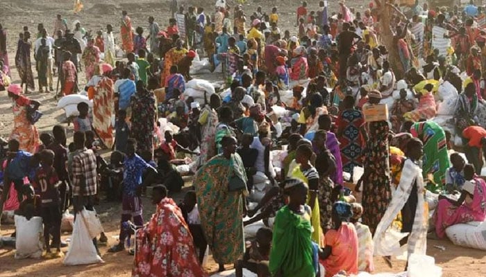 Internally displaced women wait at the food distribution center in Bentiu, South Sudan. —AFP/File