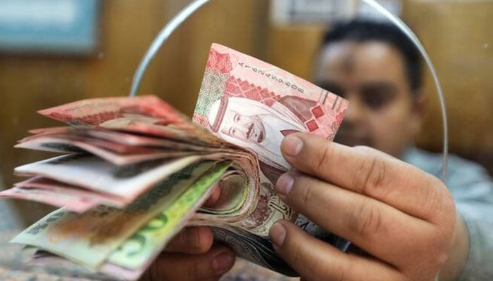 An employee counts Saudi Riyal bills at a money exchange office in central Cairo, Egypt, March 20, 2019.—Reuters/File