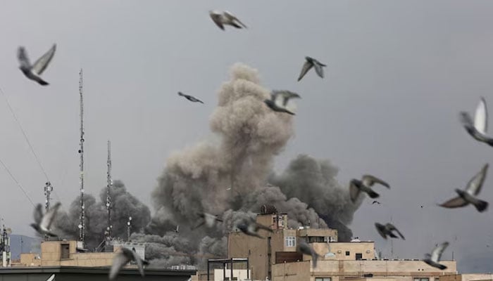 Birds fly as smoke rises following an explosion, after Israel and the US launched strikes on Iran, amid the US-Israel conflict with Iran, in Tehran, Iran, March 2, 2026.—Reuters