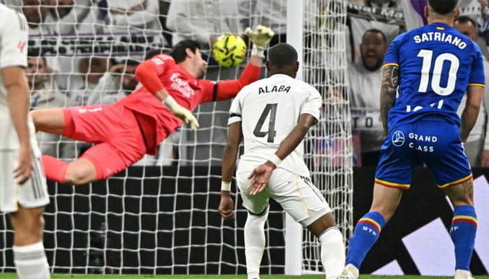 Getafes Uruguayan forward Martin Satriano scores the winner against Real Madrid at the Santiago Bernabeu on Monday. —AFP