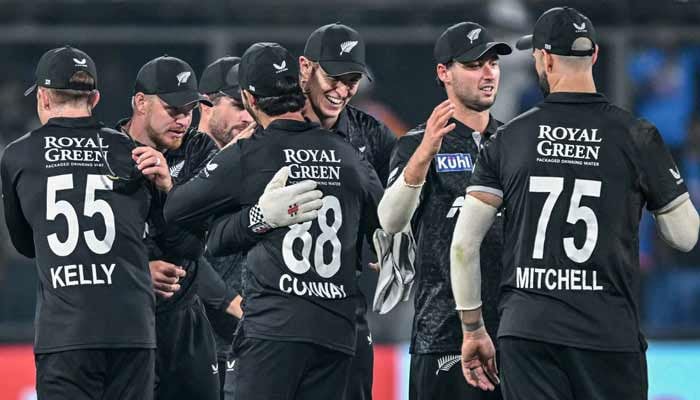 New Zealand´s players celebrate after winning the third one-day international (ODI) cricket match between India and New Zealand at the Holkar Cricket Stadium in Indore on January 18, 2026.— AFP