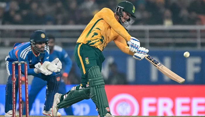 South African opener Quinton de Kock plays a shot during the second Twenty20 international against India at the Maharaja Yadavindra Singh International Cricket Stadium on the outskirts of Chandigarh on December 11, 2025.—AFP