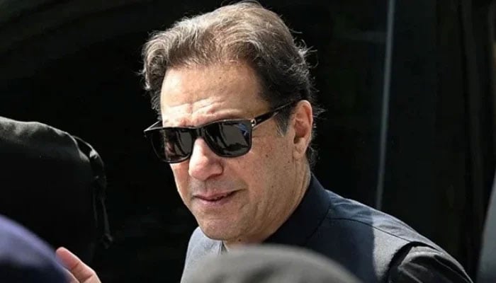 PTI founder Imran Khan arrives to appear in the Supreme Court in Islamabad on July 24, 2023. — AFP