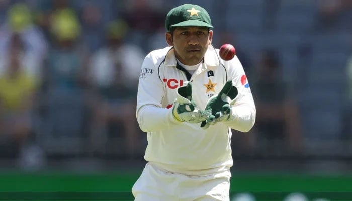 Sarfaraz Ahmed of Pakistan takes the ball during day one of the Mens First Test match between Australia and Pakistan at Optus Stadium on December 14, 2023 in Perth, Australia. — AFP